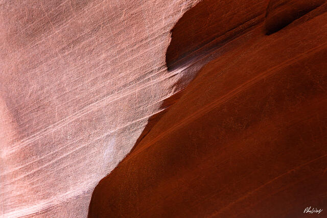 Smooth sandstone textures shaped by water erosion in Antelope Canyon Arizona.