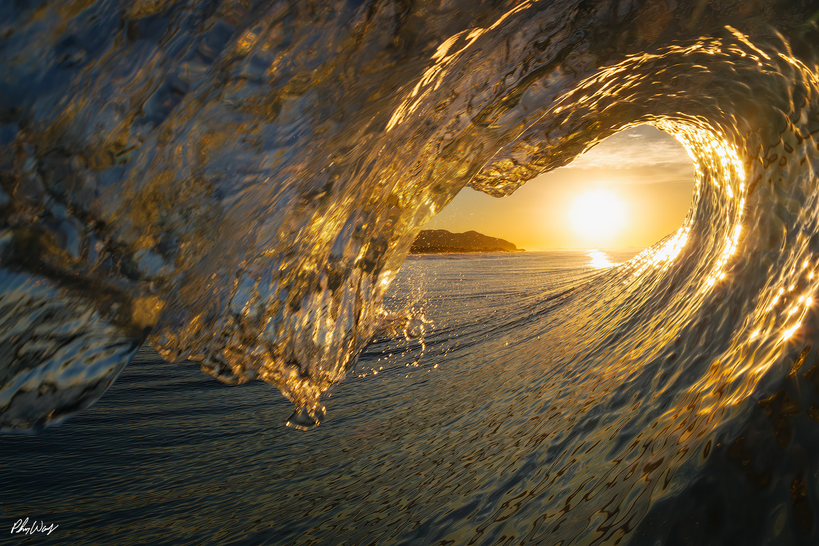 Oxnard Texture Wave Golden sunrise light illuminating textured ocean wave as it curls in Oxnard, California.